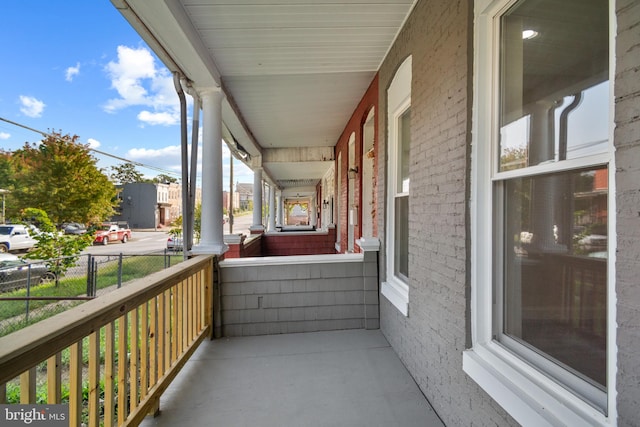 balcony featuring a porch