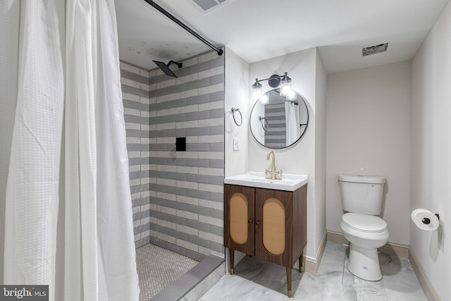 bathroom with vanity, toilet, and a shower with shower curtain