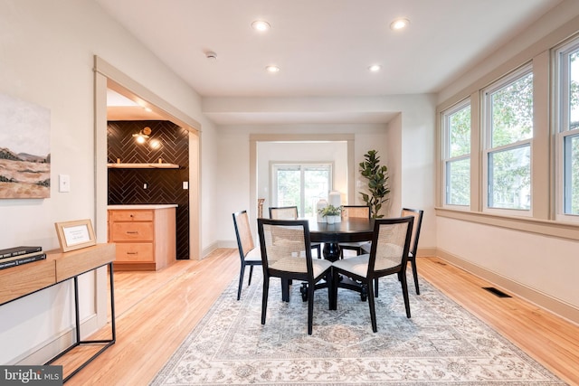 dining room with light wood-type flooring