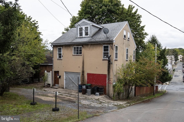 view of home's exterior with a garage