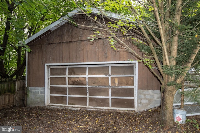 garage with wood walls