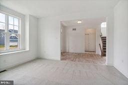 view of carpeted empty room