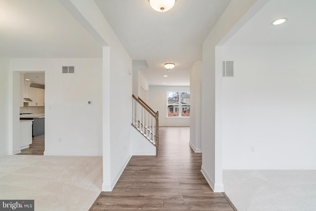 hall featuring wood-type flooring