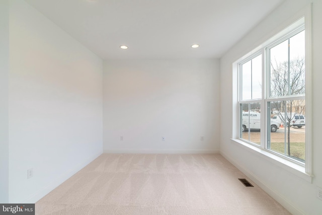 view of carpeted spare room