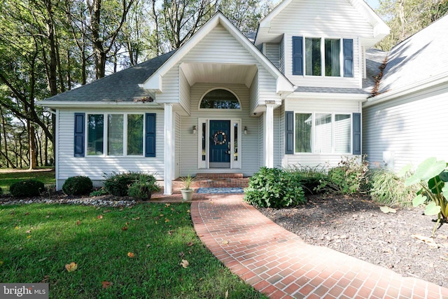 view of front of home with a front yard