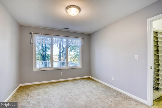 view of carpeted spare room