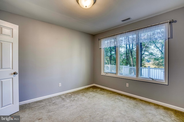 spare room with carpet flooring