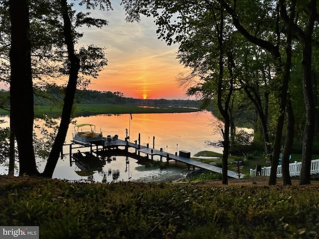 view of dock with a water view