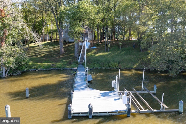 dock area featuring a water view