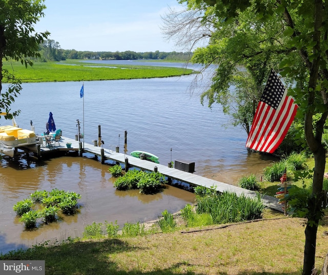 view of dock with a water view