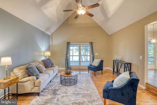 living room with light hardwood / wood-style flooring and plenty of natural light