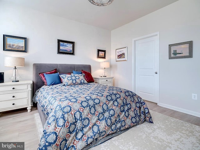 bedroom featuring light hardwood / wood-style floors