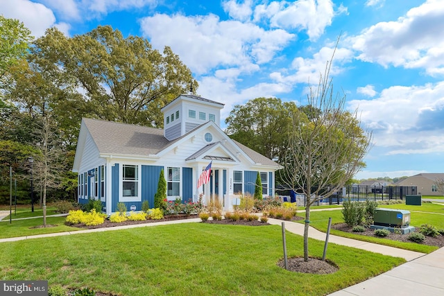 view of front of home featuring a front lawn