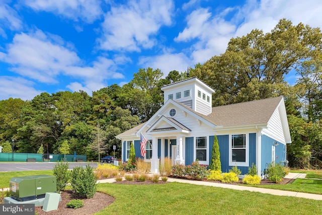 view of front facade with a front lawn