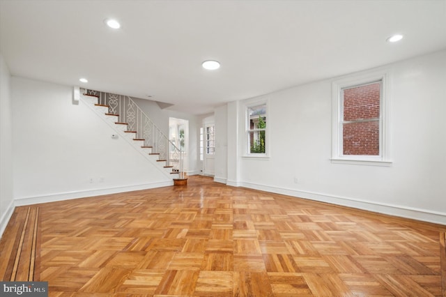 basement featuring light parquet floors