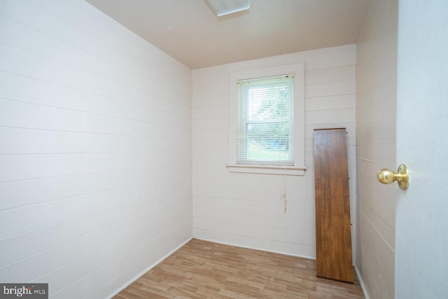 spare room with light wood-type flooring