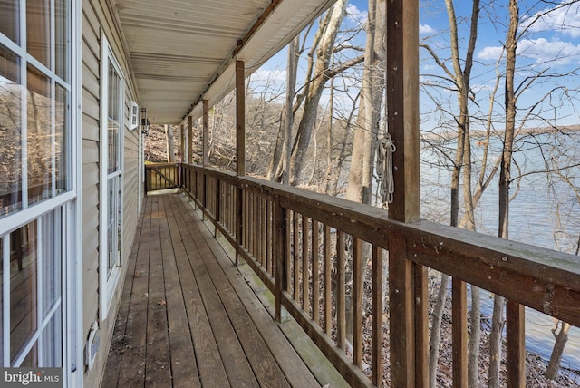 wooden terrace with a water view