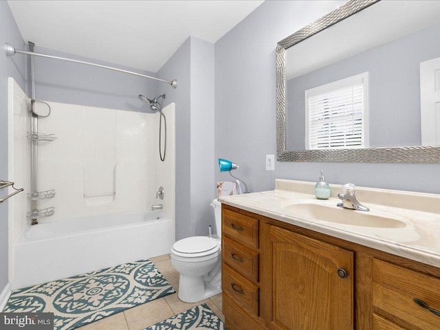 full bathroom featuring tile patterned flooring, vanity, toilet, and shower / bathing tub combination