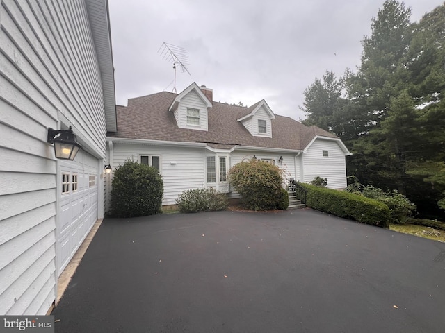 exterior space featuring a garage