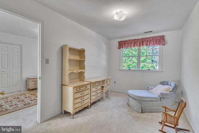 sitting room with light carpet