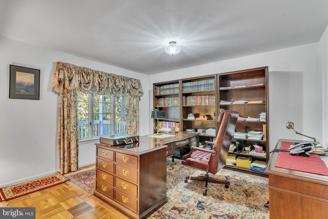 office space with light parquet floors