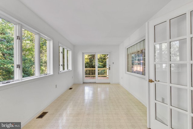 11160 Cove Lake Rd, Lusby, MD 20657 - unfurnished sunroom with tile patterned floors, visible vents, and baseboards