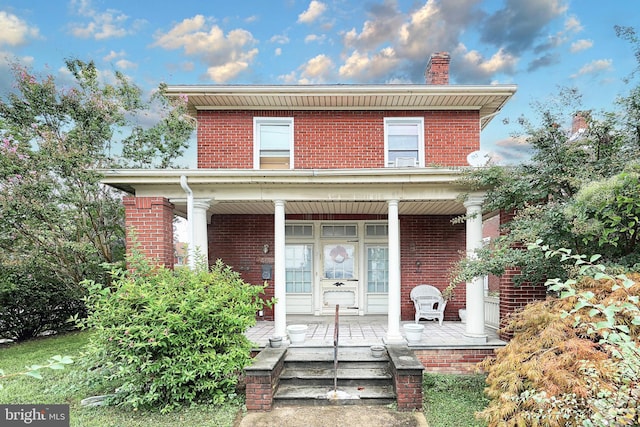 front facade featuring covered porch