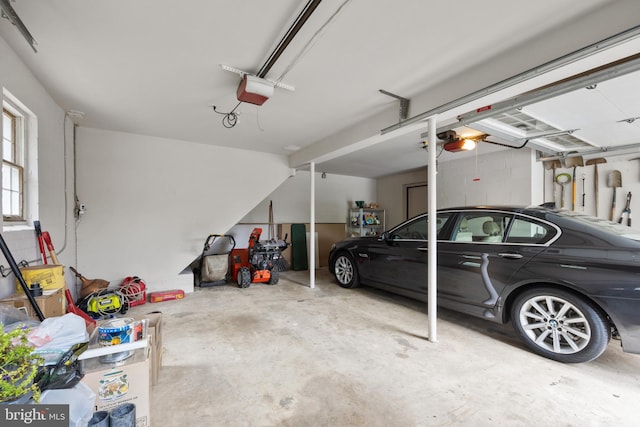 garage featuring a garage door opener