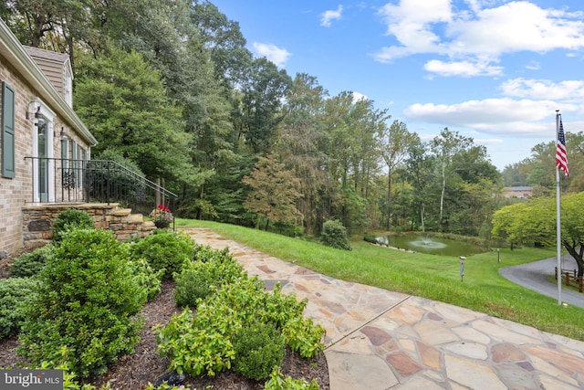 view of yard featuring a water view