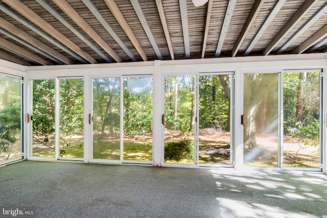 unfurnished sunroom with plenty of natural light