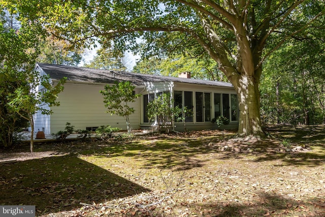 exterior space with a sunroom