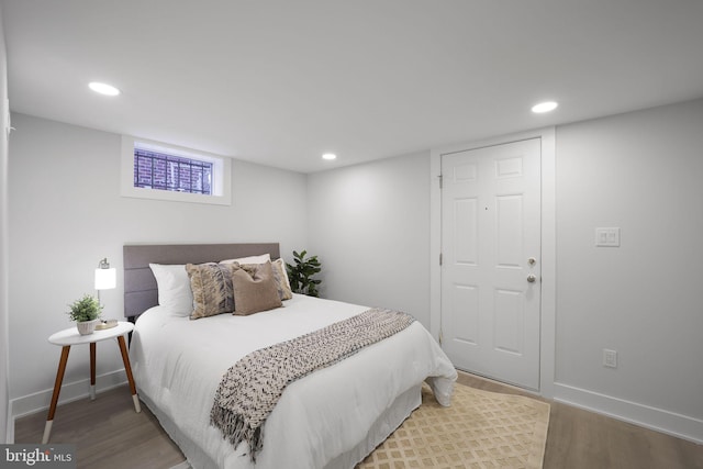 bedroom featuring hardwood / wood-style flooring