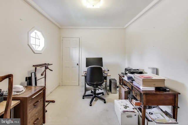 home office with light colored carpet, crown molding, and baseboards