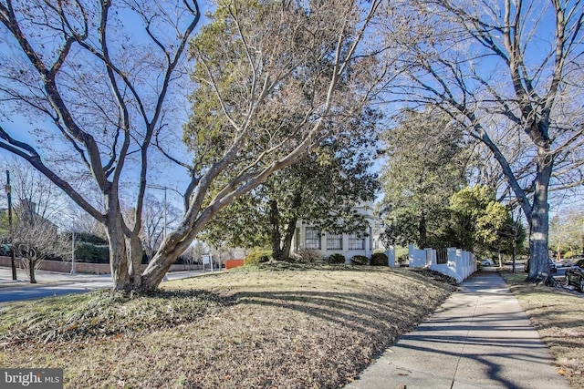 obstructed view of property featuring fence