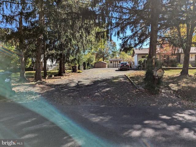 view of road featuring driveway