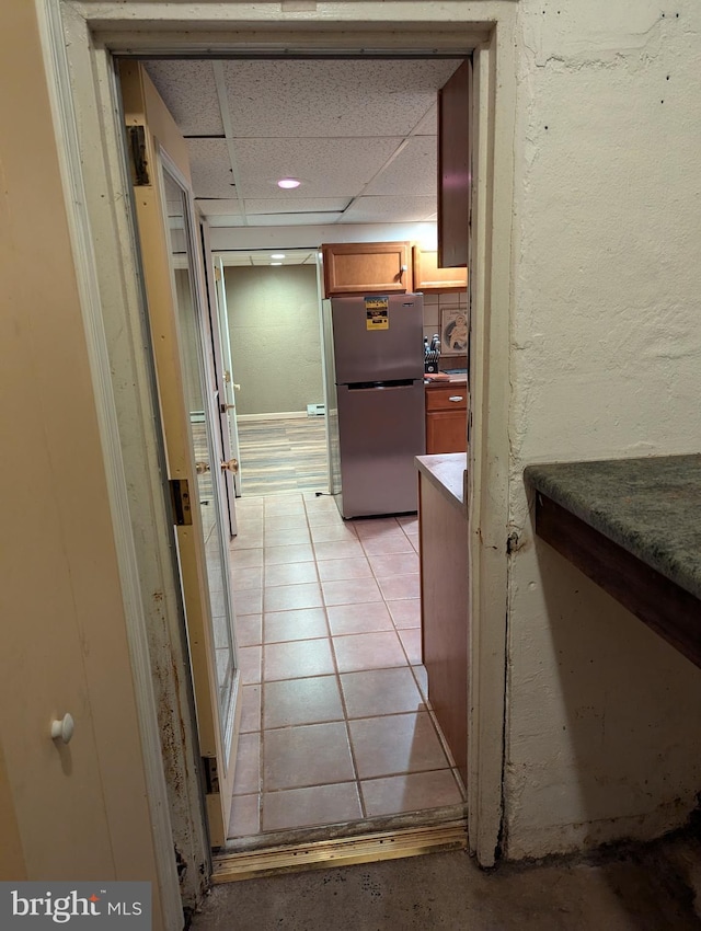 corridor with a drop ceiling