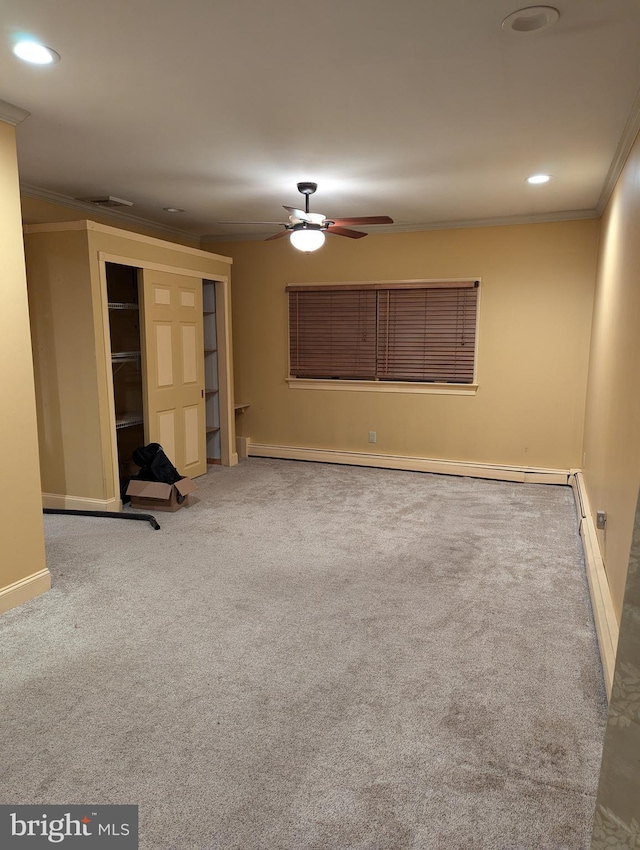 unfurnished room featuring crown molding, carpet floors, baseboards, and recessed lighting