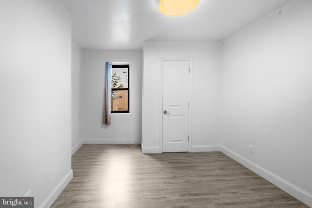 empty room with light wood-type flooring