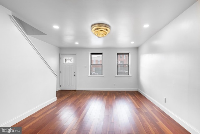 foyer featuring dark wood-type flooring