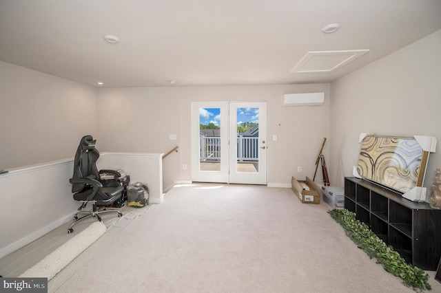 interior space featuring a wall mounted air conditioner and carpet