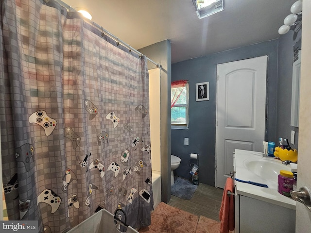 full bathroom featuring vanity, toilet, shower / bathtub combination with curtain, and tile patterned flooring