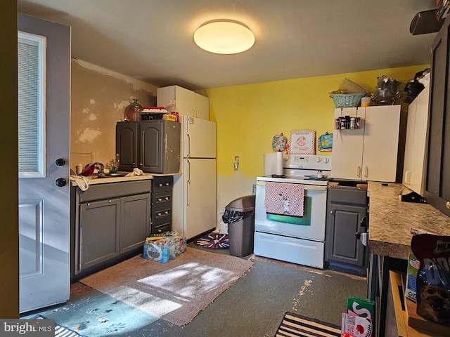 kitchen with white appliances, sink, and gray cabinets