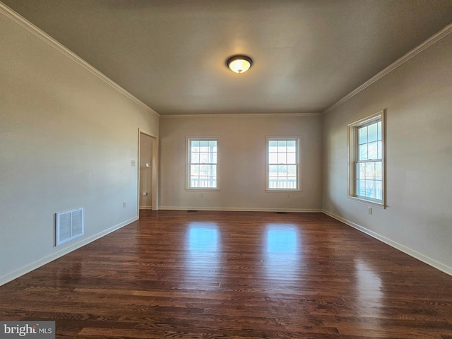 unfurnished room featuring crown molding and dark wood-type flooring