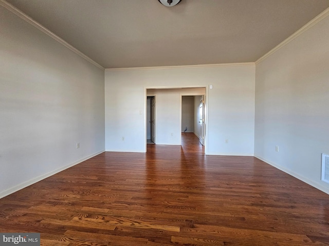 unfurnished room with dark hardwood / wood-style flooring and crown molding