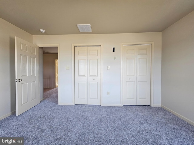 unfurnished bedroom with carpet flooring