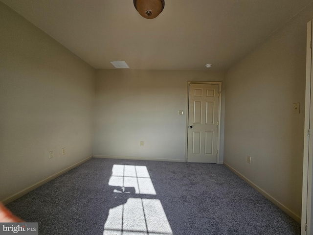 empty room featuring carpet