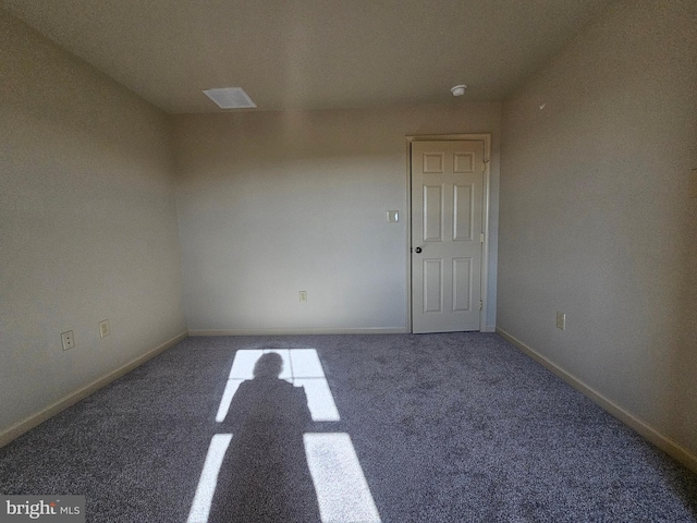 spare room with carpet flooring