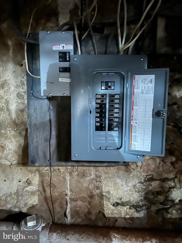 utility room featuring electric panel