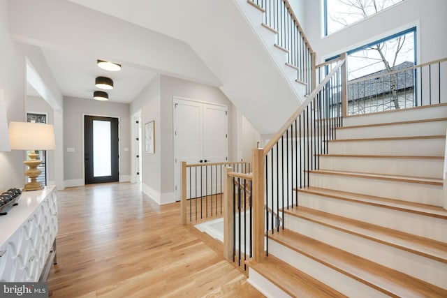 foyer entrance with light hardwood / wood-style flooring