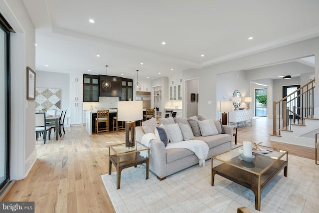 living room with light hardwood / wood-style floors